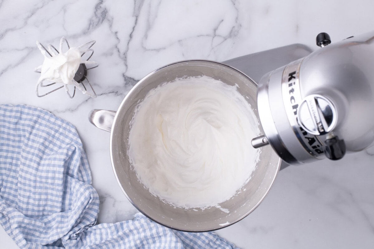 homemade whipped cream in a stand mixer bowl