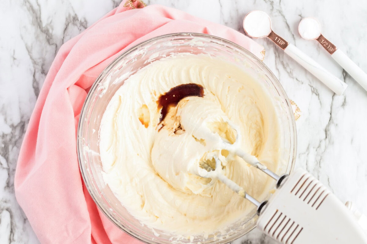 Vanilla added to a bowl of batter
