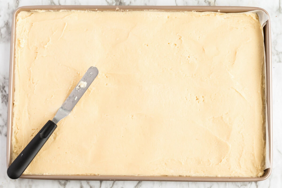 dough pressed into a jelly roll pan