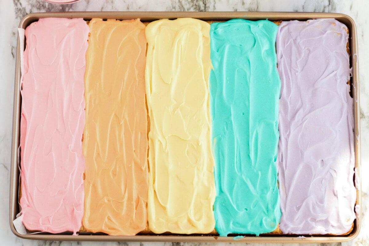 Frosted Sugar Cookie Bars in a jelly roll pan