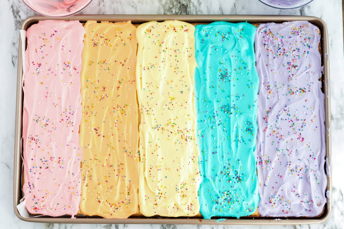 Frosted Sugar Cookie Bars topped with sprinkles