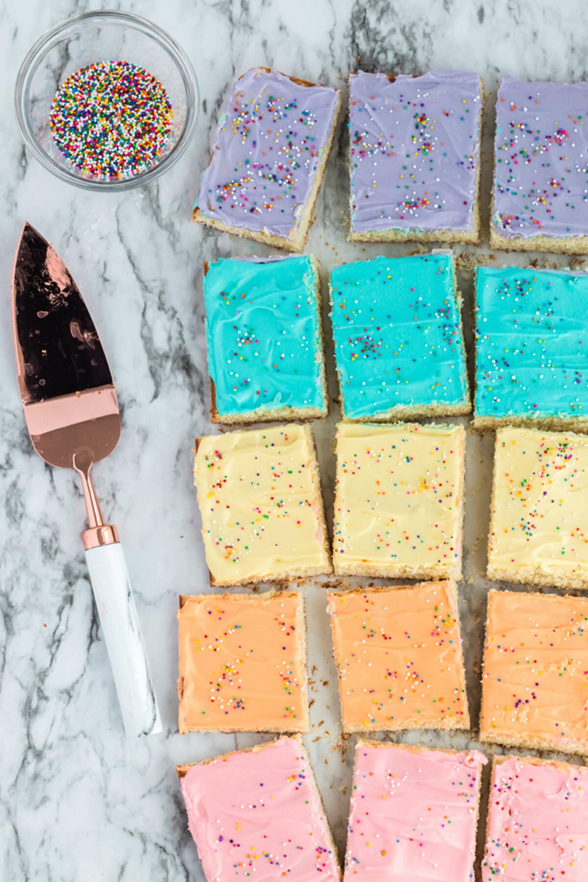 Frosted Sugar Cookie Bars resting on a table