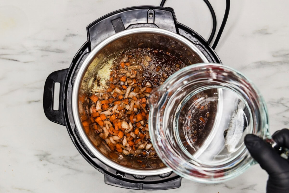 pouring water into instant pot