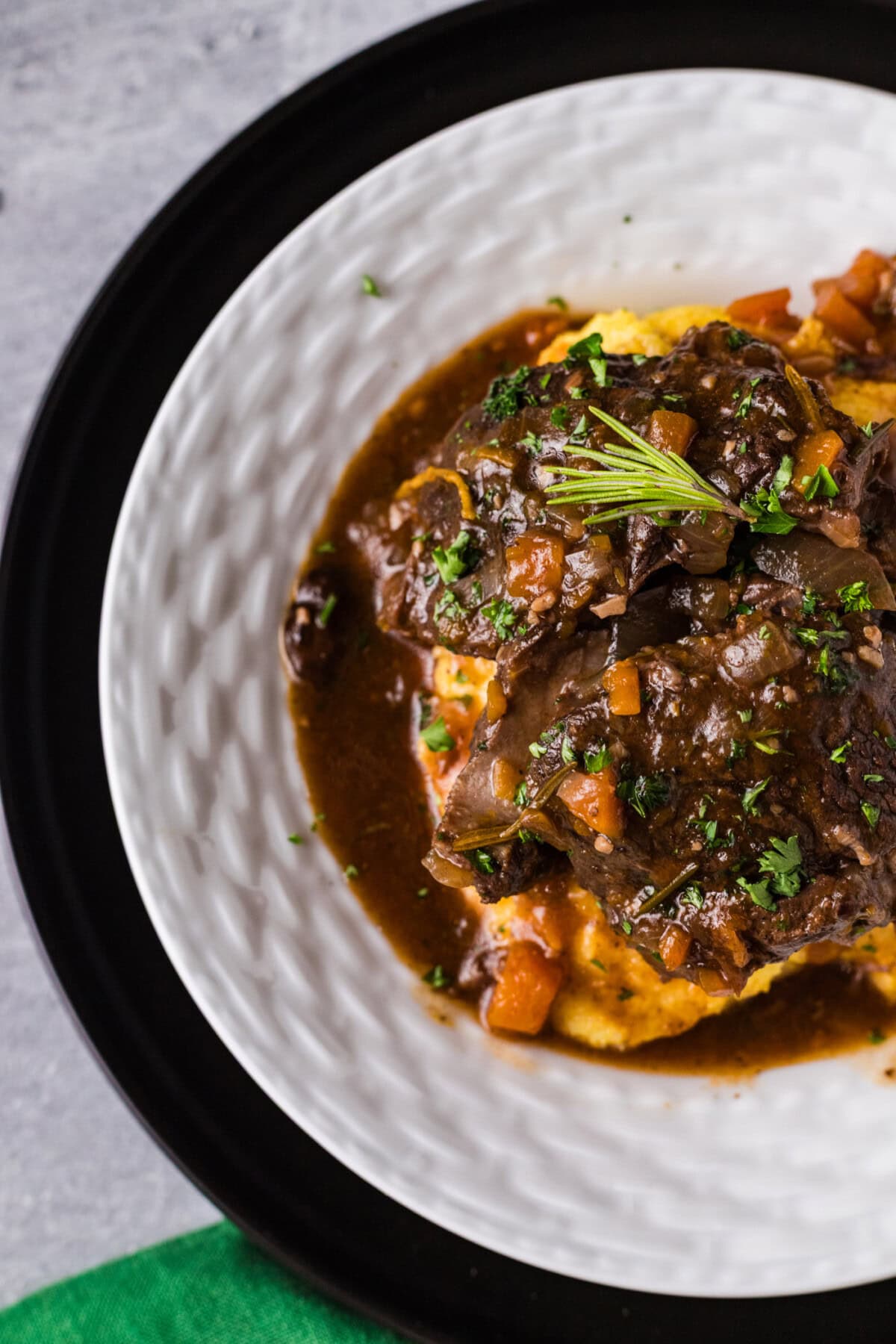 Close up photo of a half a plate of Instant Pot Beef Shanks