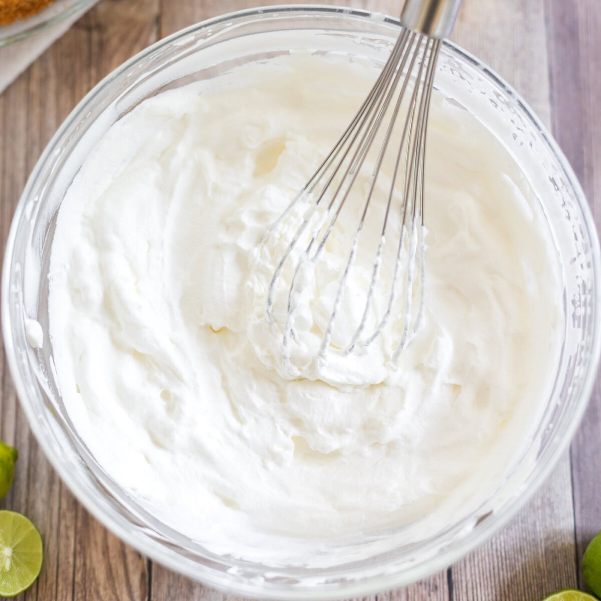 whipped cream with a whisk in it