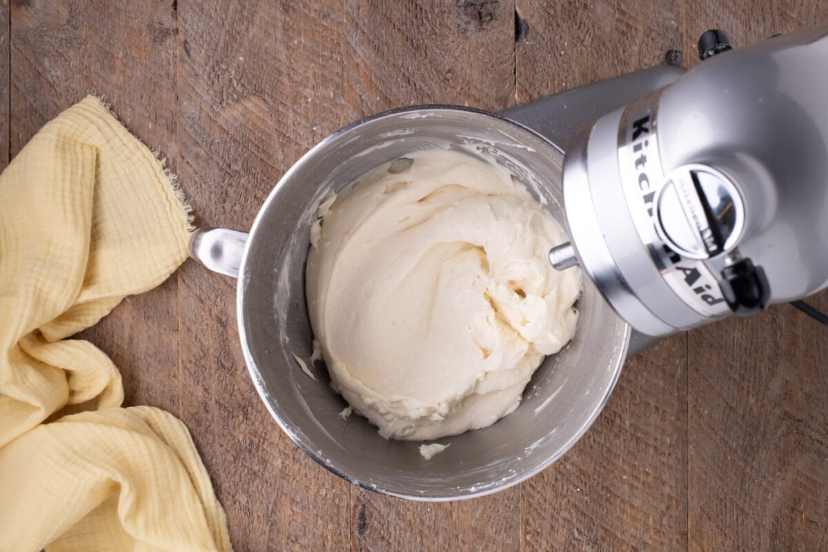 cream cheese frosting in a stand mixer bowl