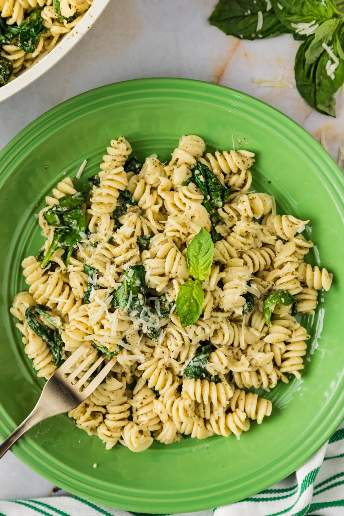 Plate of Pesto Pasta with a fork in it