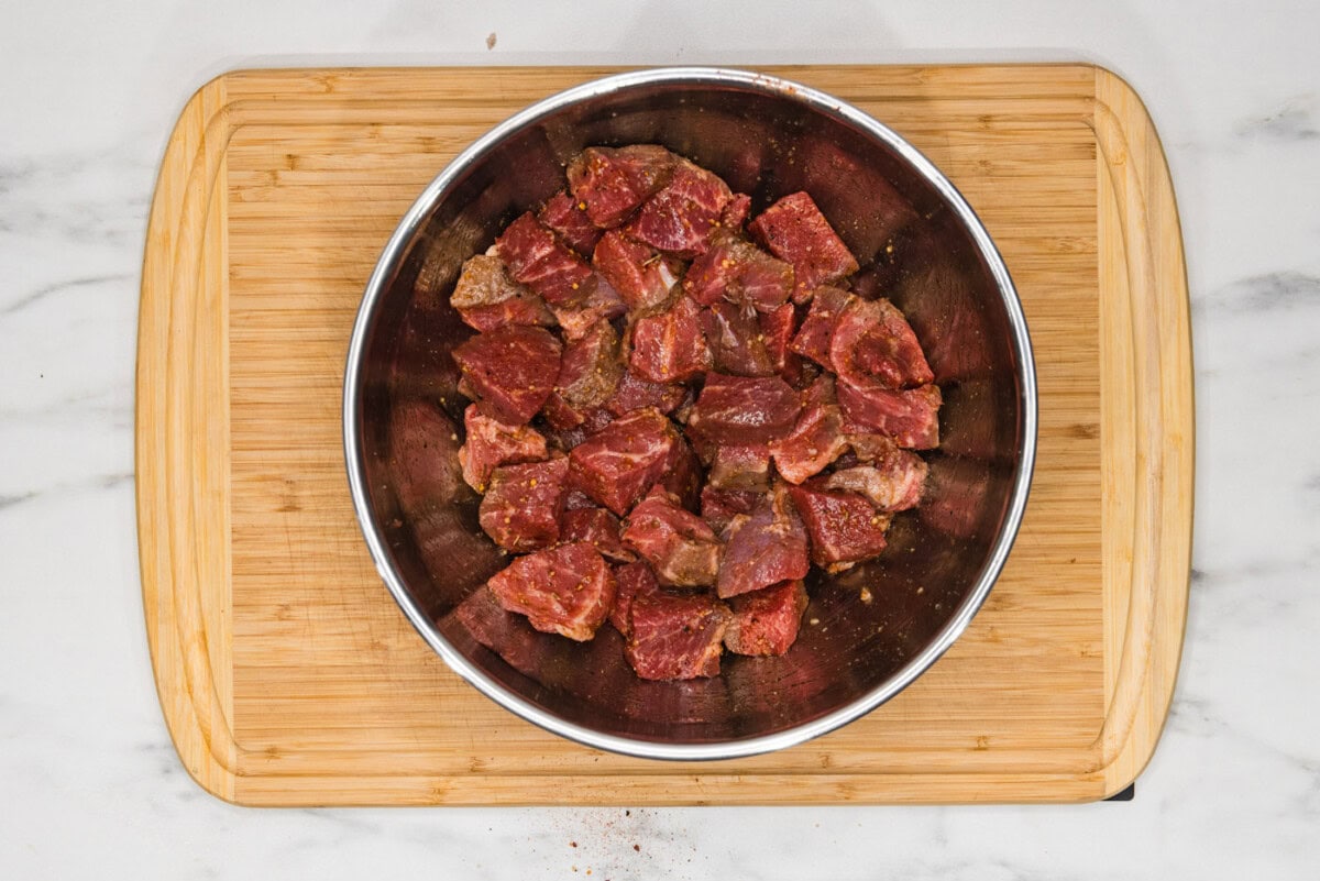 seasoned cubed steak in a bowl