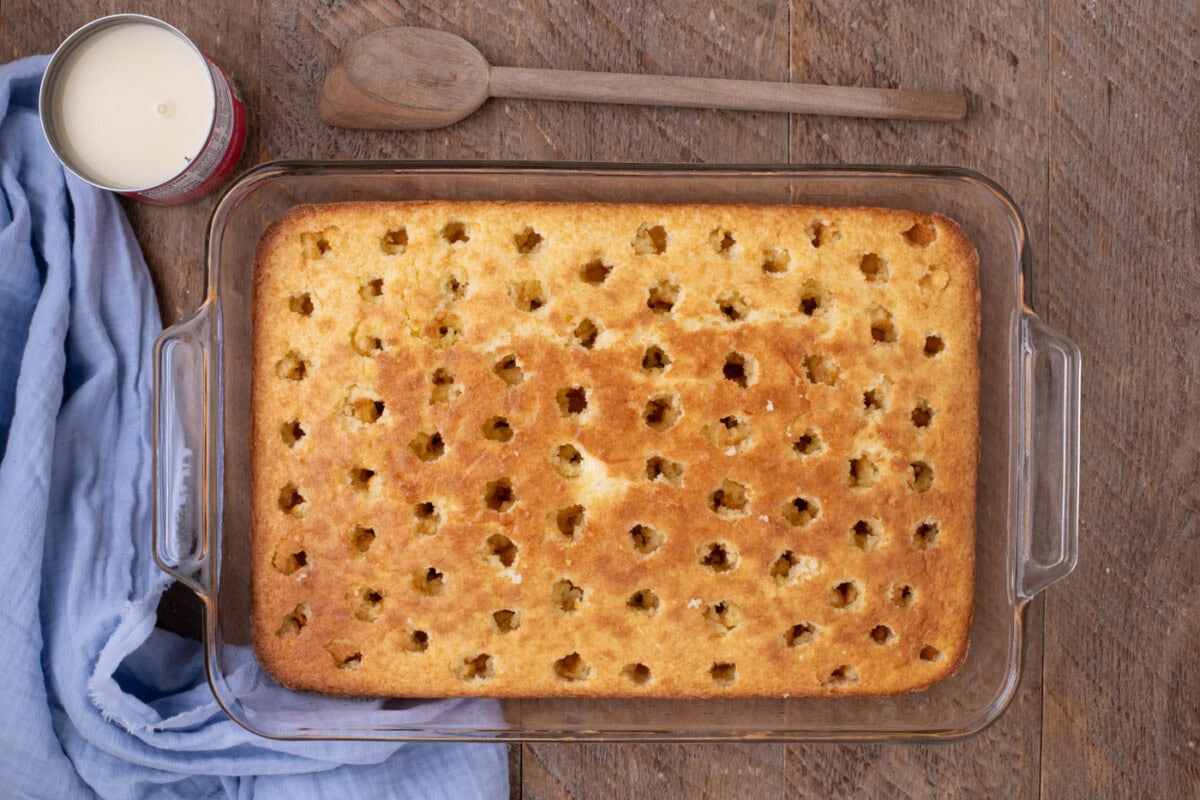 holes poked into baked cake