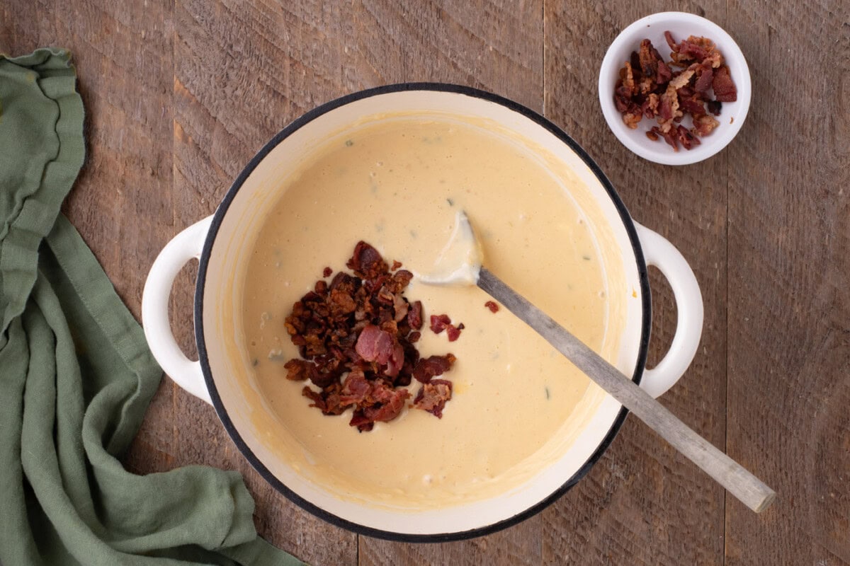crumbled bacon mixed into jalapeno cheese sauce