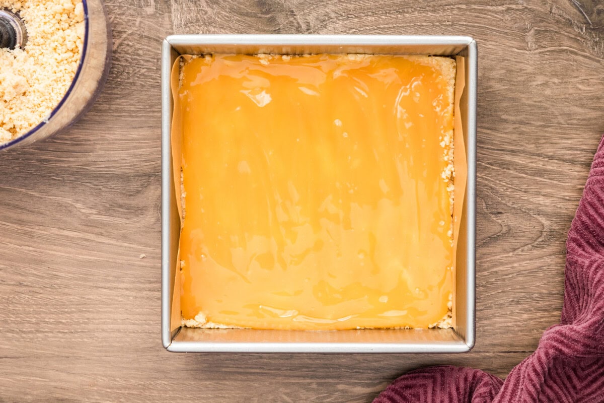 Lemon curd layer added over the crust