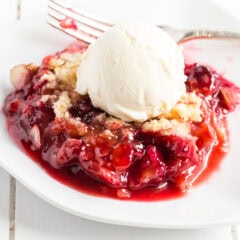 Bowl of Prize Winning Rhubarb Crumble topped with ice cream