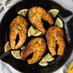 Close up photo of Salmon Steaks in a skillet