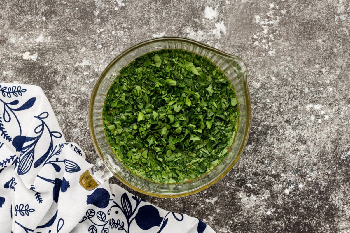 parsley mixed with broth in a bowl