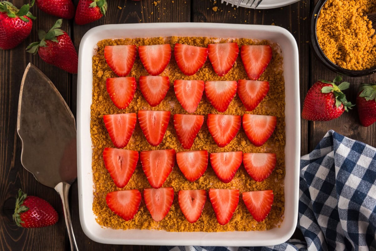 overhead of strawberry dream dessert with sliced strawberries