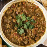 Close up photo of a skillet of Beef Curry
