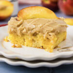 Close up photo of a slice of Brown Sugar Peach Cake on a plate