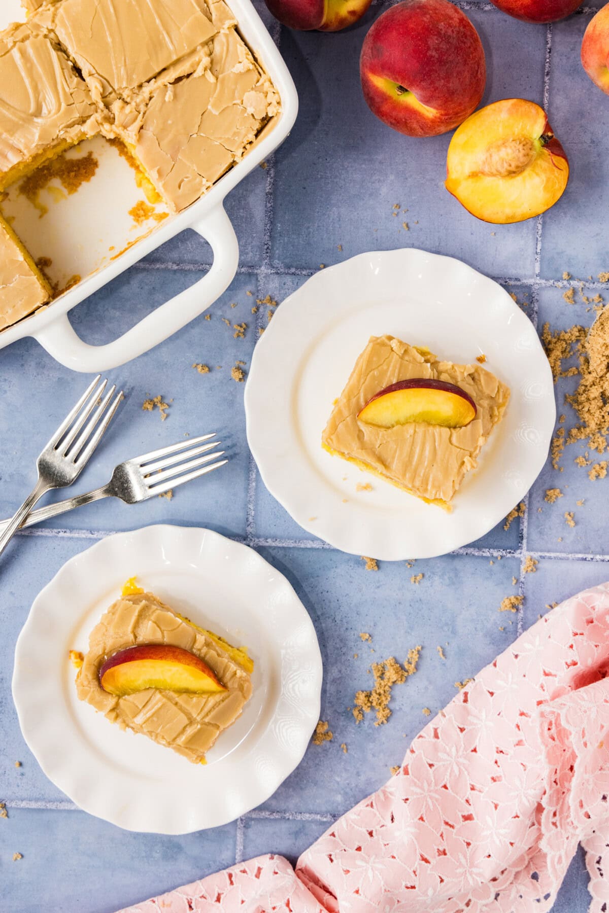 Slices of Brown Sugar Peach Cake on plates
