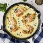 Close up photo of a skillet of Chicken Florentine