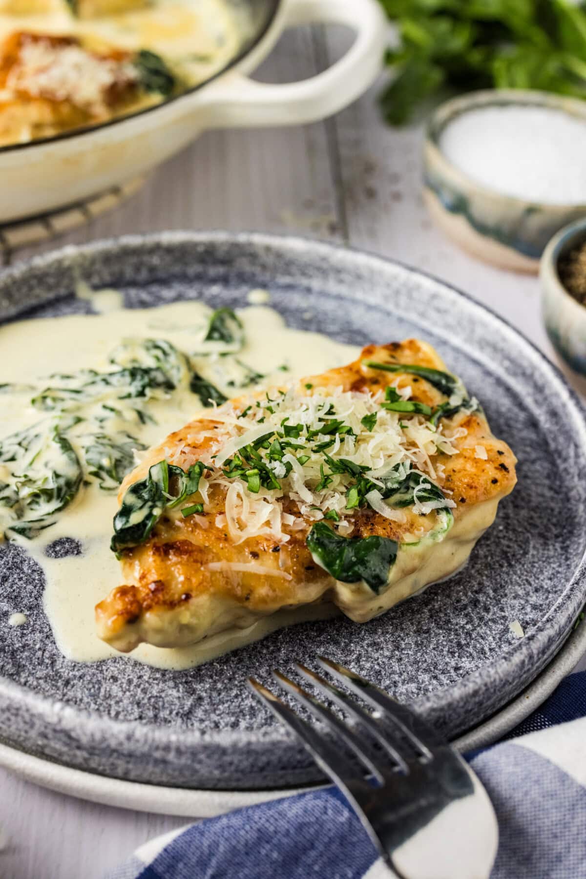 Chicken Florentine on a plate with a fork