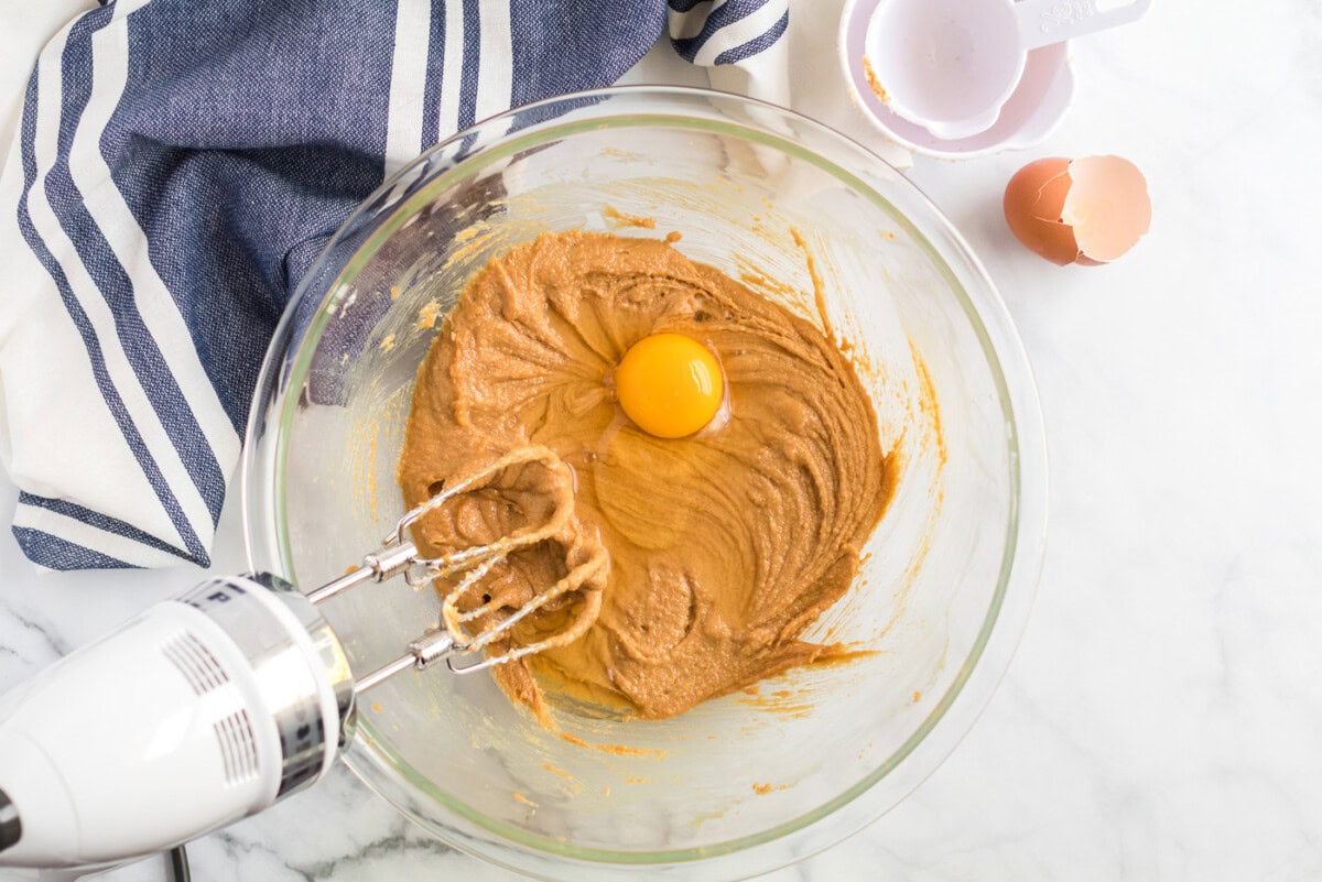 Egg being added to the creamed mixture