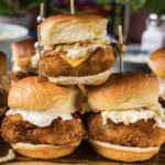 Close up photo of three Fish Sliders stacked up