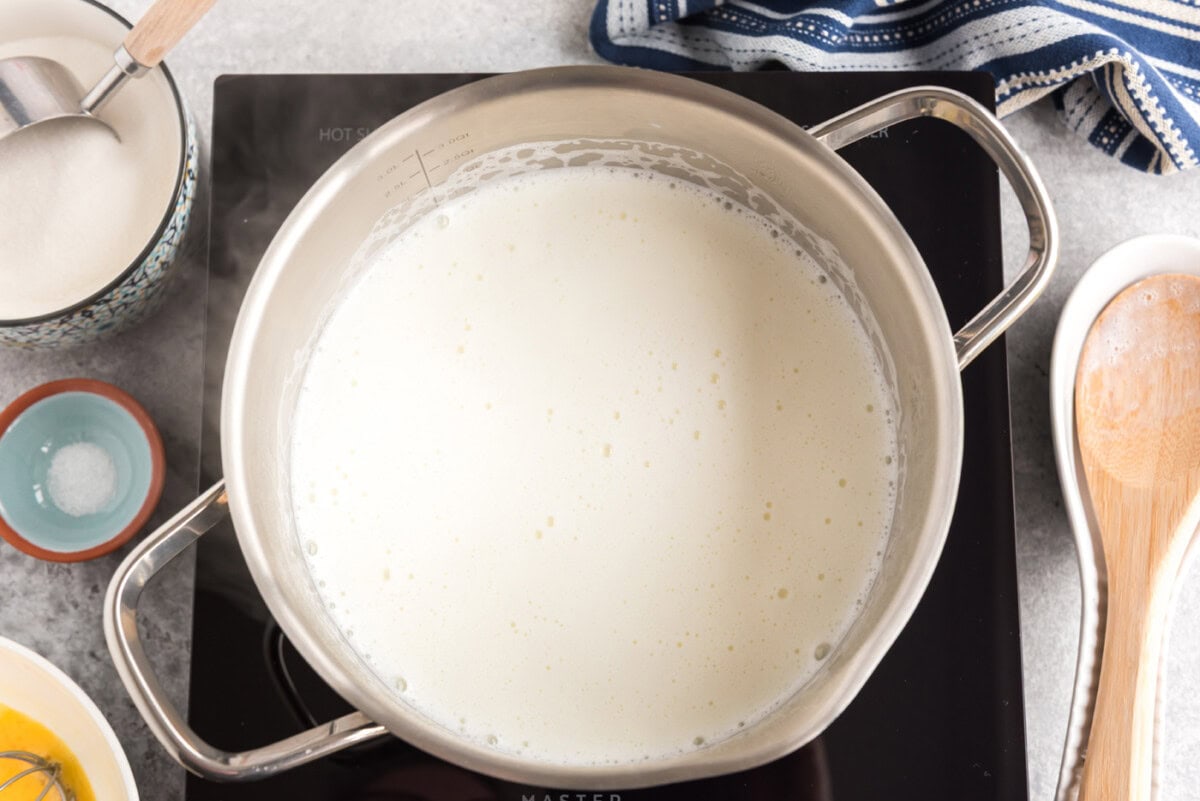milk heated in a pot