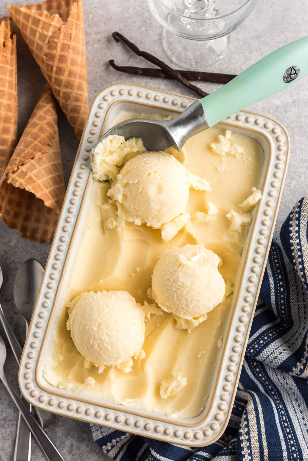 Scoops of Homemade Vanilla Ice Cream in a container