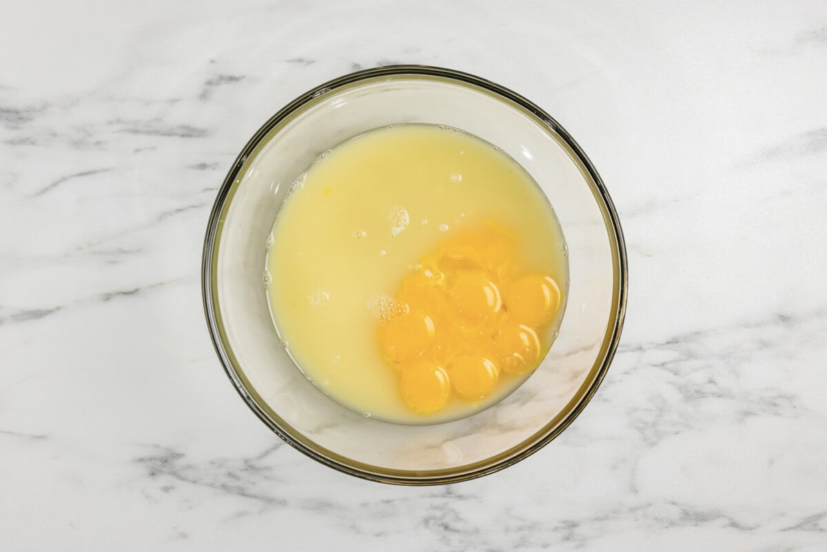 egg yolks, lime juice, and sweetened condensed milk in a bowl