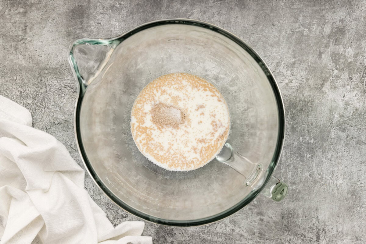 yeast over warm milk in a bowl