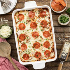 Close up photo of a casserole dish of Sausage & Pepperoni Pizza Casserole