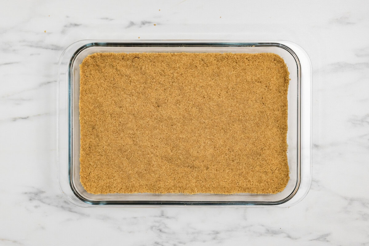 graham cracker crust in a baking dish