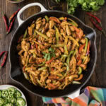 Close up photo of a skillet of Chicken Fajitas