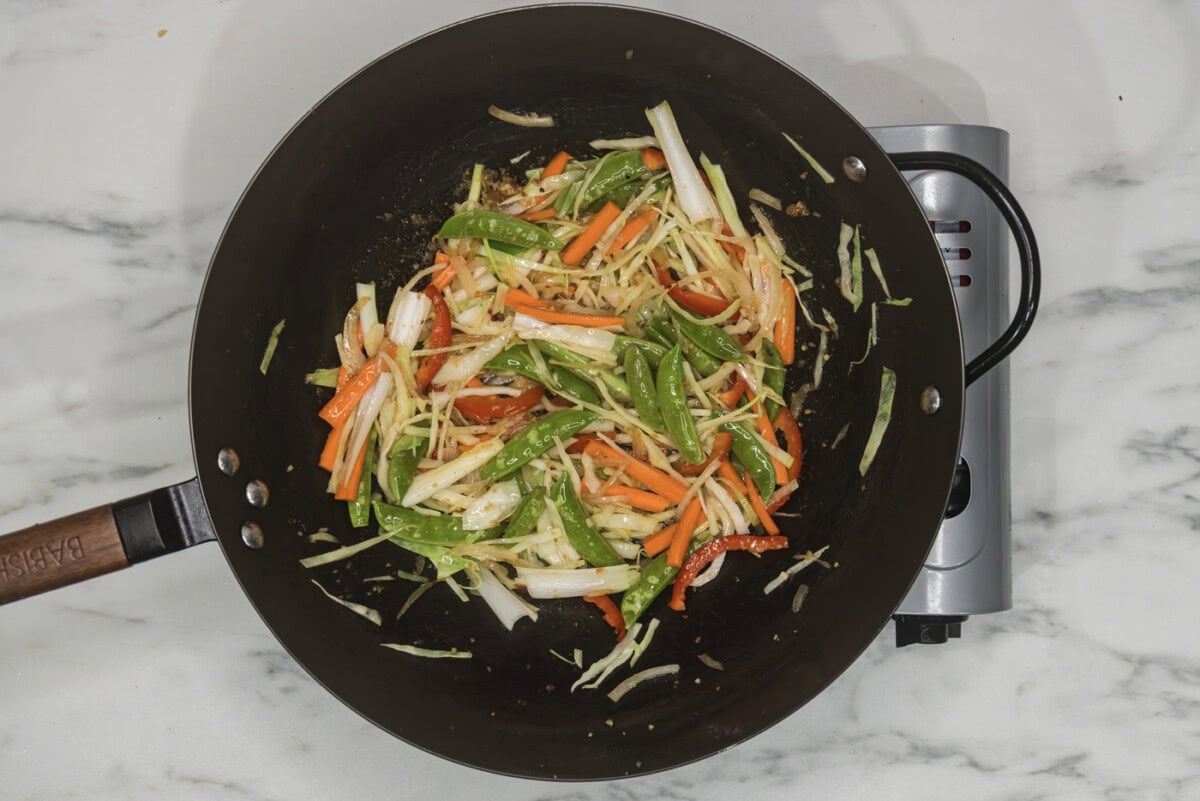 stir fry veggies in a wok