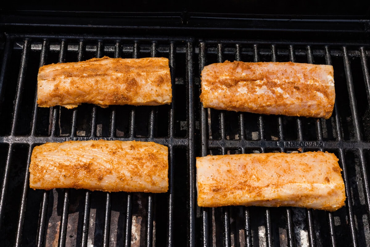 seasoned mahi mahi filets on a grill
