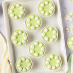 Close up photo of Keto Lime Cheesecake Bites on a baking sheet