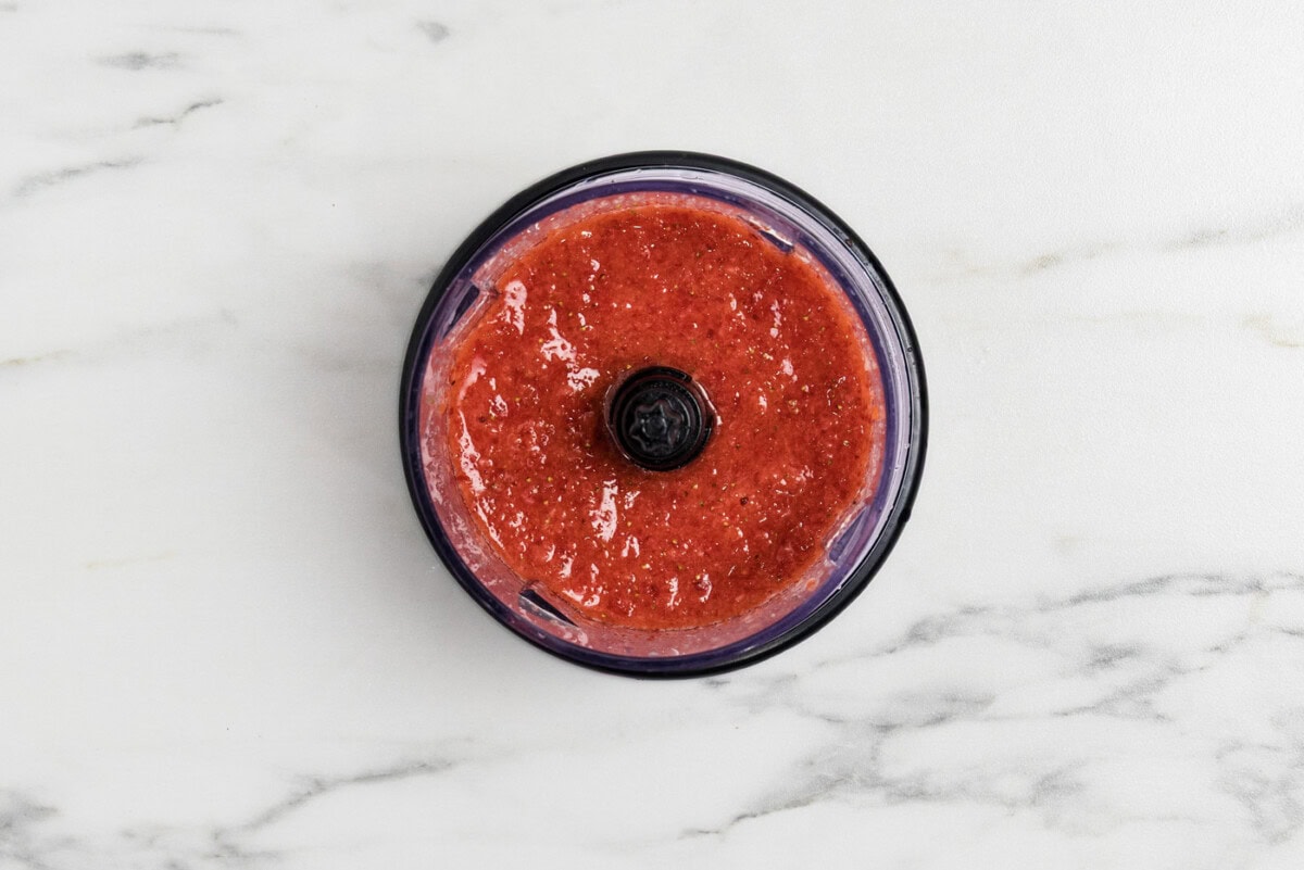 macerated strawberry mixture in a food processor