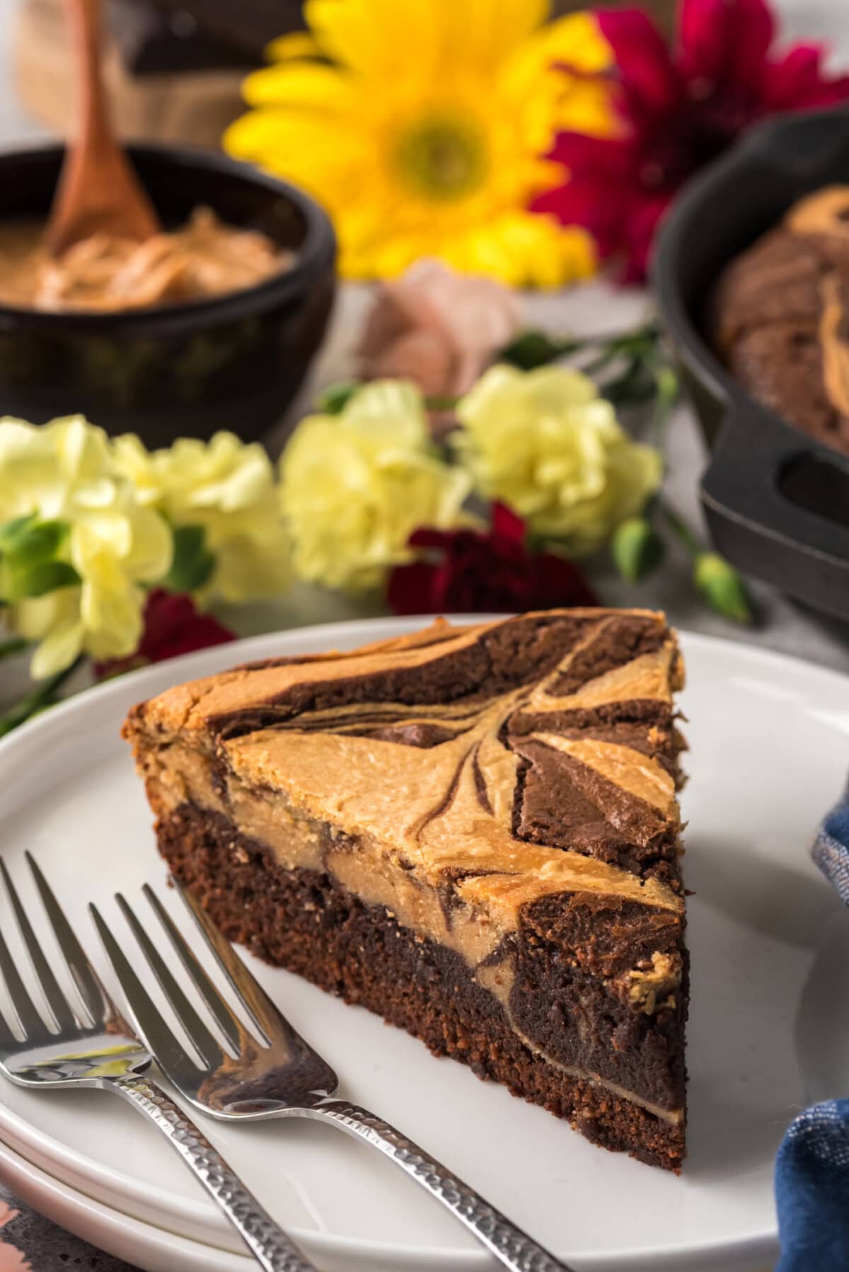 Slice of Peanut Butter Marbled Brownie Skillet Pie on a plate