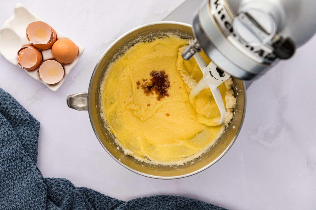 vanilla added to butter mixture in a stand mixer bowl