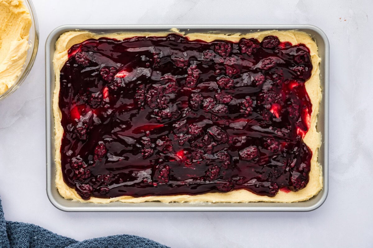 blackberry pie filling spread over cookie dough base