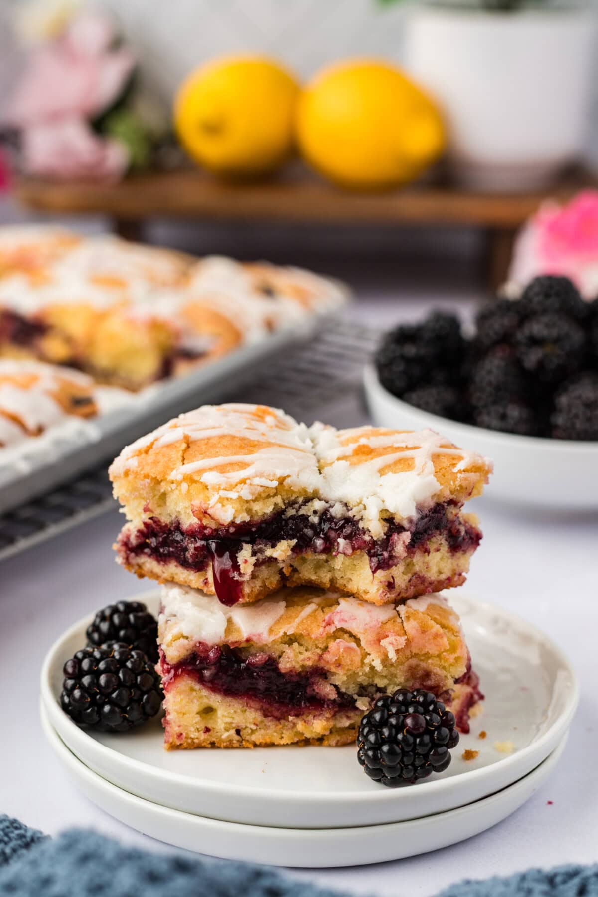 Stack of two Blackberry Pie Squares on a plate