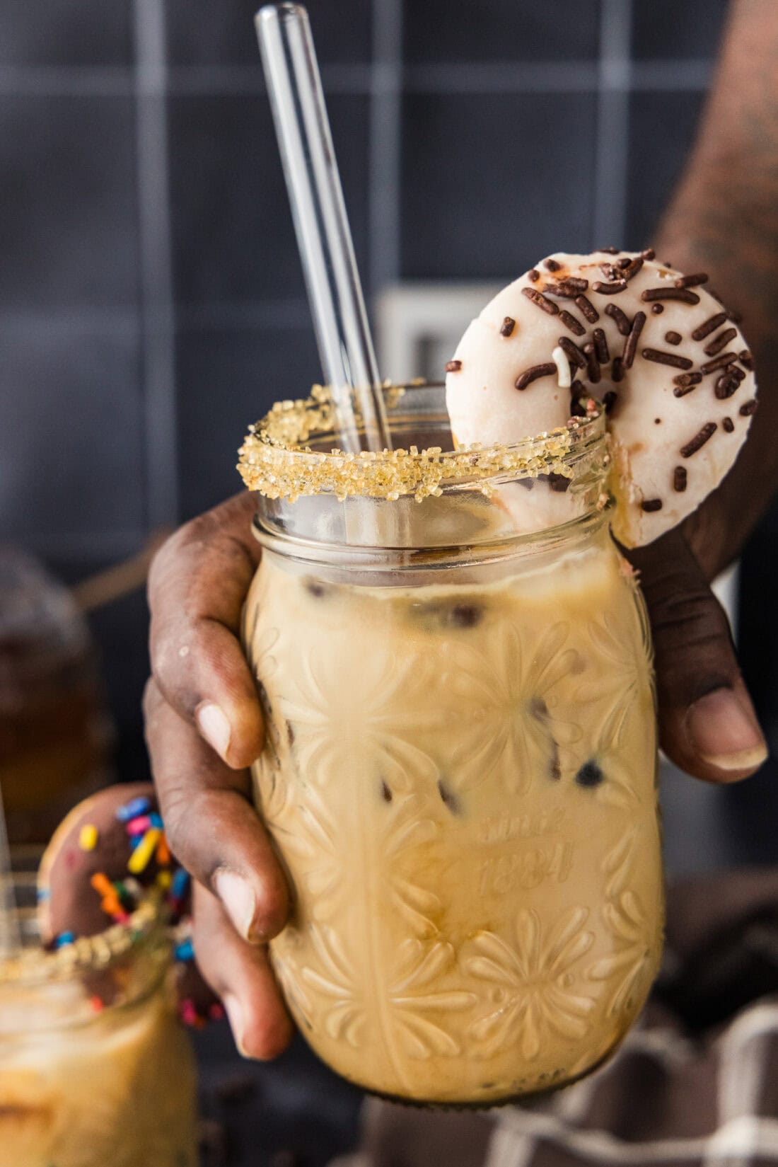 Hand holding up an Iced Espresso Cocktail