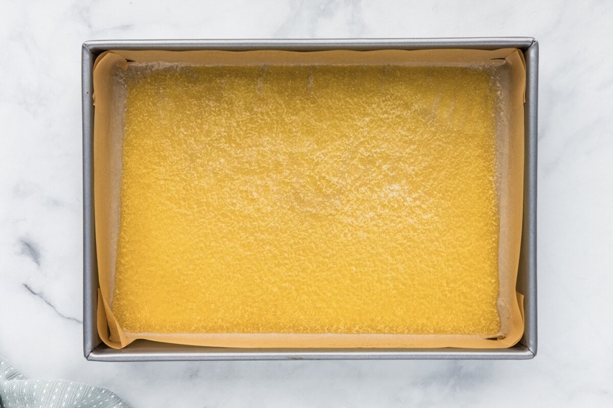 melted butter in a baking pan