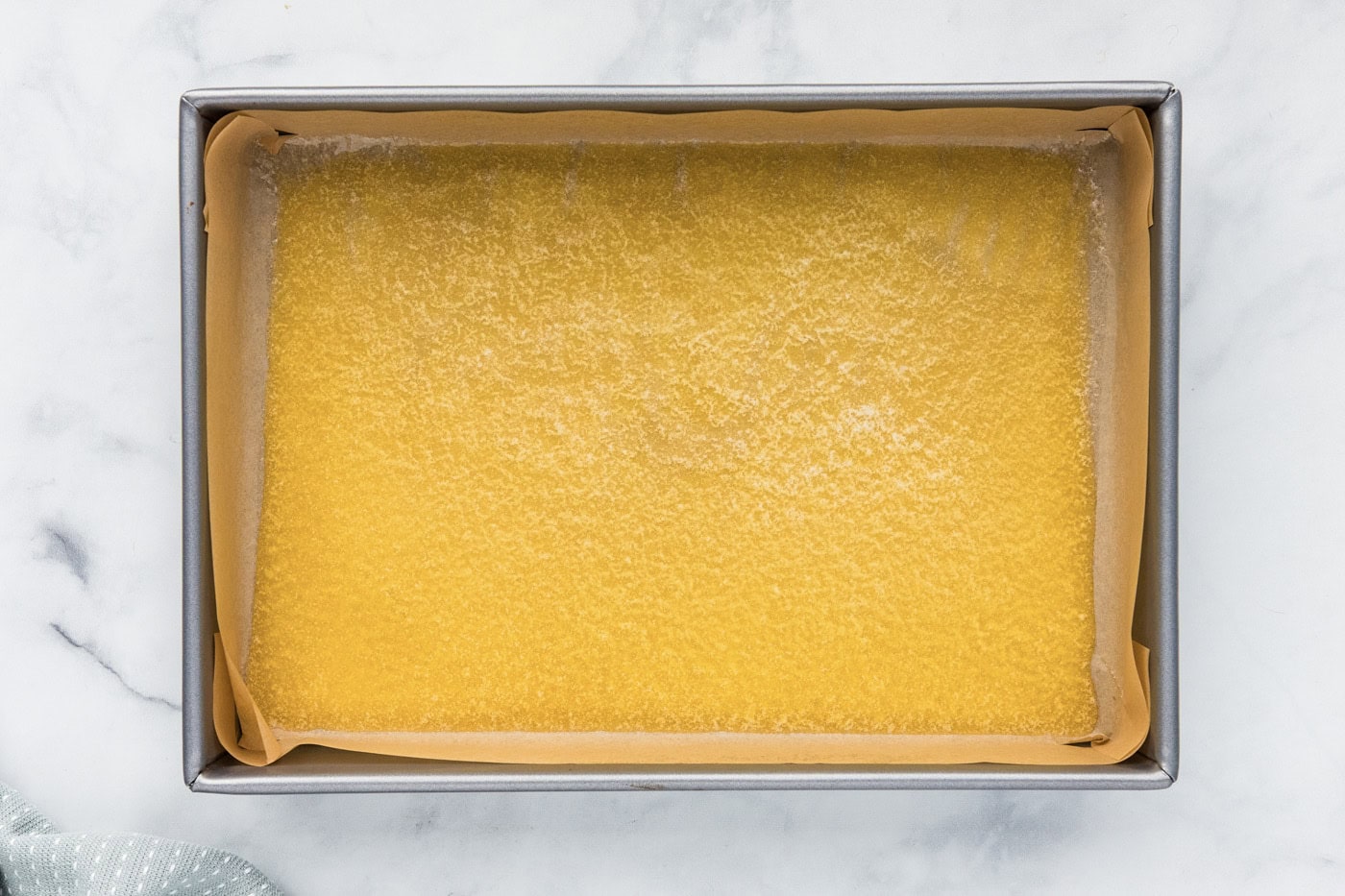 melted butter in a baking pan