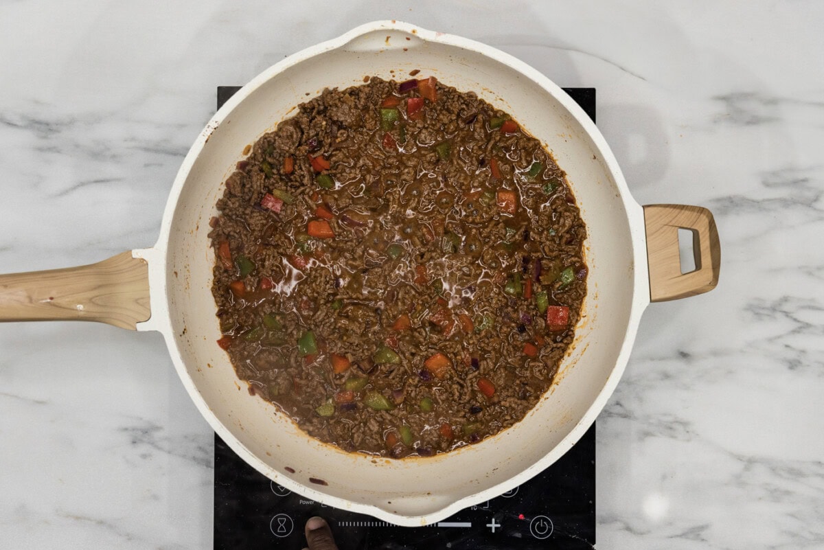 Philly cheesesteak sloppy joe mixture in a skillet