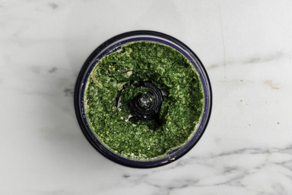 blitzed parmesan and spinach sauce in a food chopper