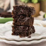 Close up photo of a stack of Zucchini Brownies
