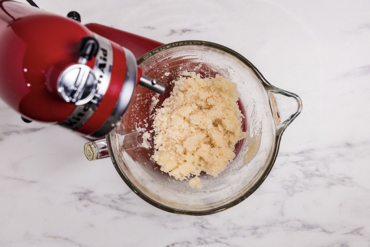 Sugar and oil mixture in a stand mixer bowl