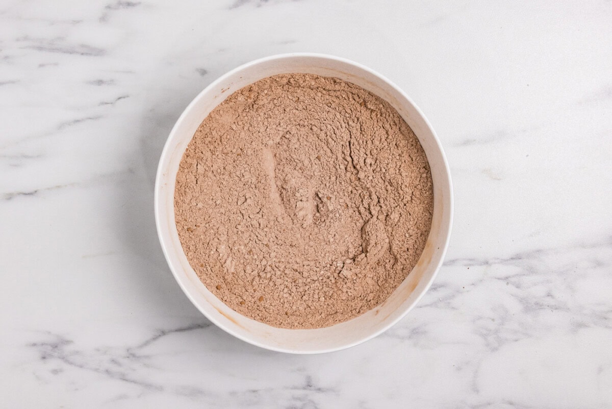 bowl of flour, cocoa powder, baking soda, and salt whisked