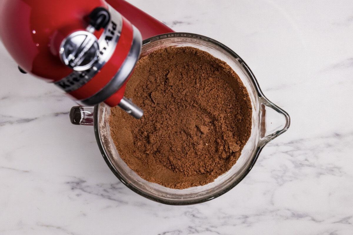 Cocoa and sugar mixture in a stand mixer bowl